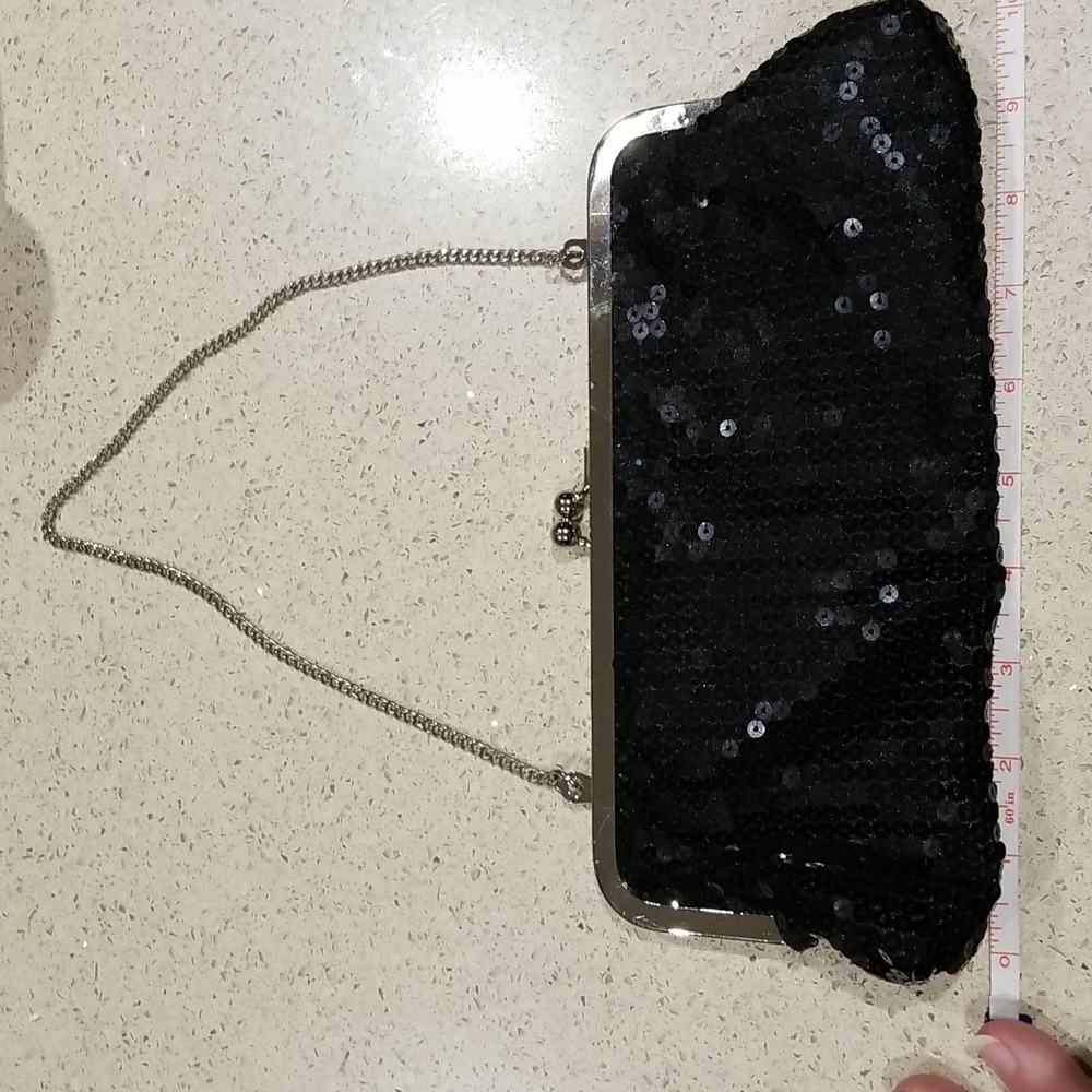 black sequin evening bag to use as clutch or has chain as well